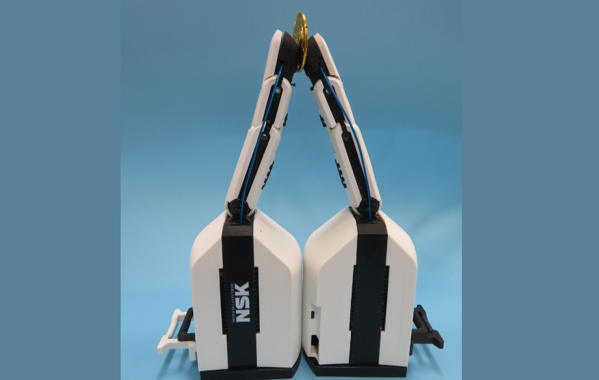 Untitled design - 1 Two finger modules, developed by NSK and the German Aerospace Centre, hold a metallic disc