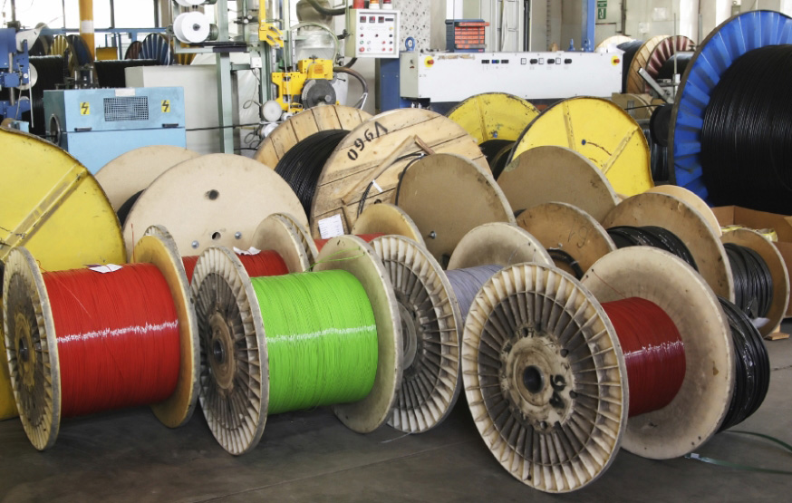 big spool of optic wire on a factory